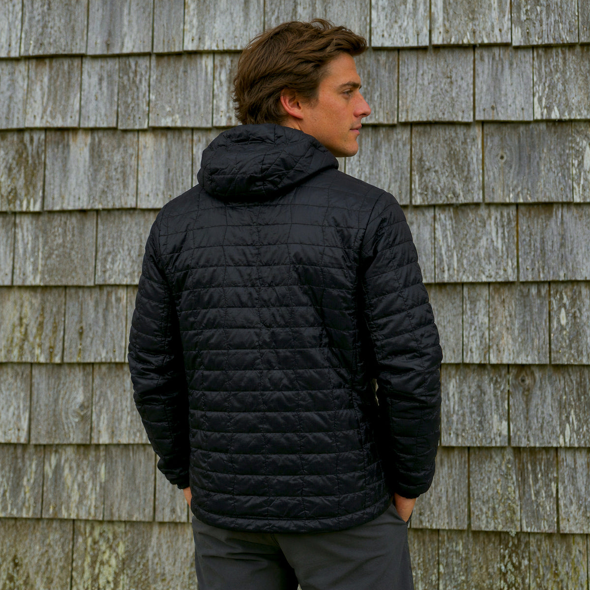 Chaqueta Parka Nuptse Lhotse negra de espalda