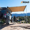 XRoad Toldo Camping — familia en el exterior bajo el toldo desplegado desde SUV