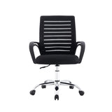 LEVO Silla Lite — en escritorio de estudio con notebook abierto