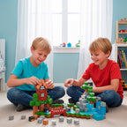 MineBlocks Aventura Bandú: dos niños armando una cabaña en el living